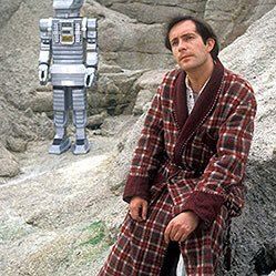 Simon Jones as Arthur Dent with Marvin in the background