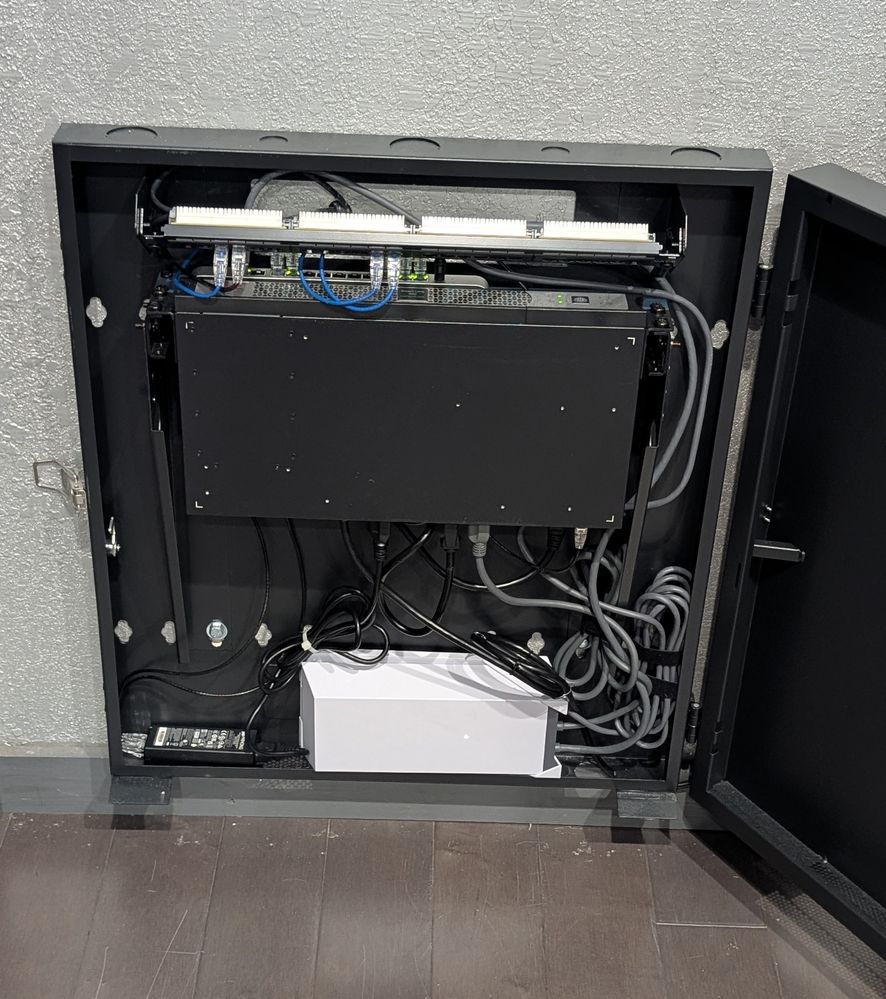 Wall mount cabinet open